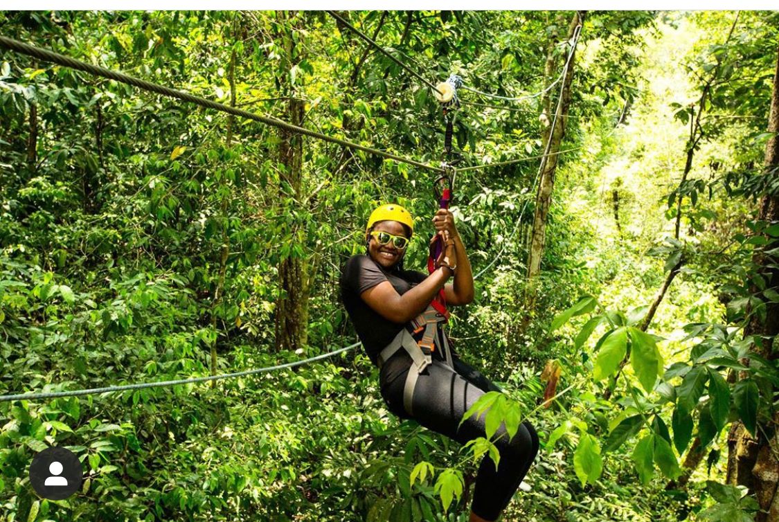 Woman ziplining on Jco Beach in Costa Rica.